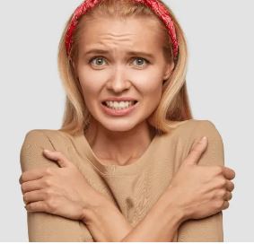 woman shivering in fear